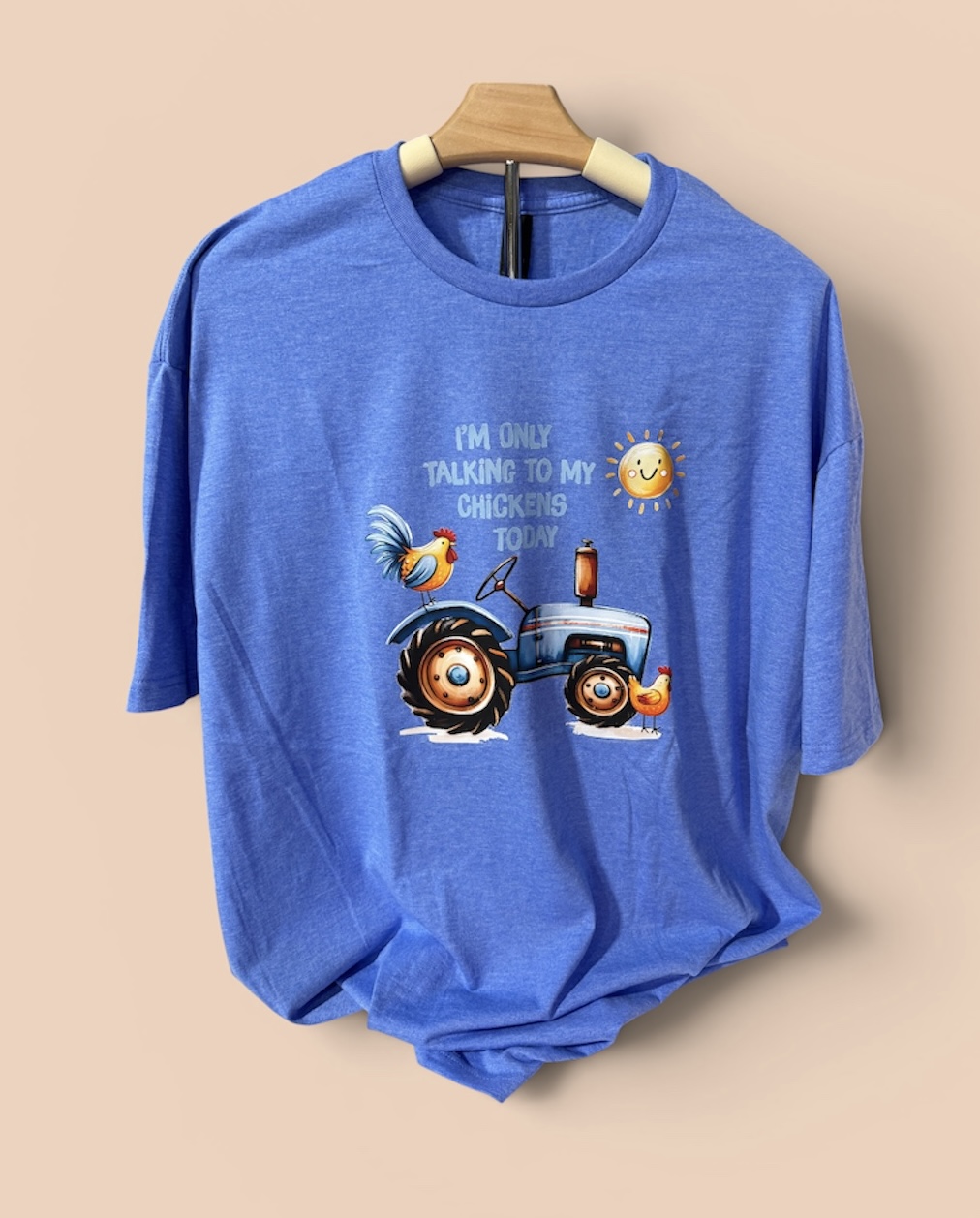 Light blue shirt with tractor and chickens graphic
