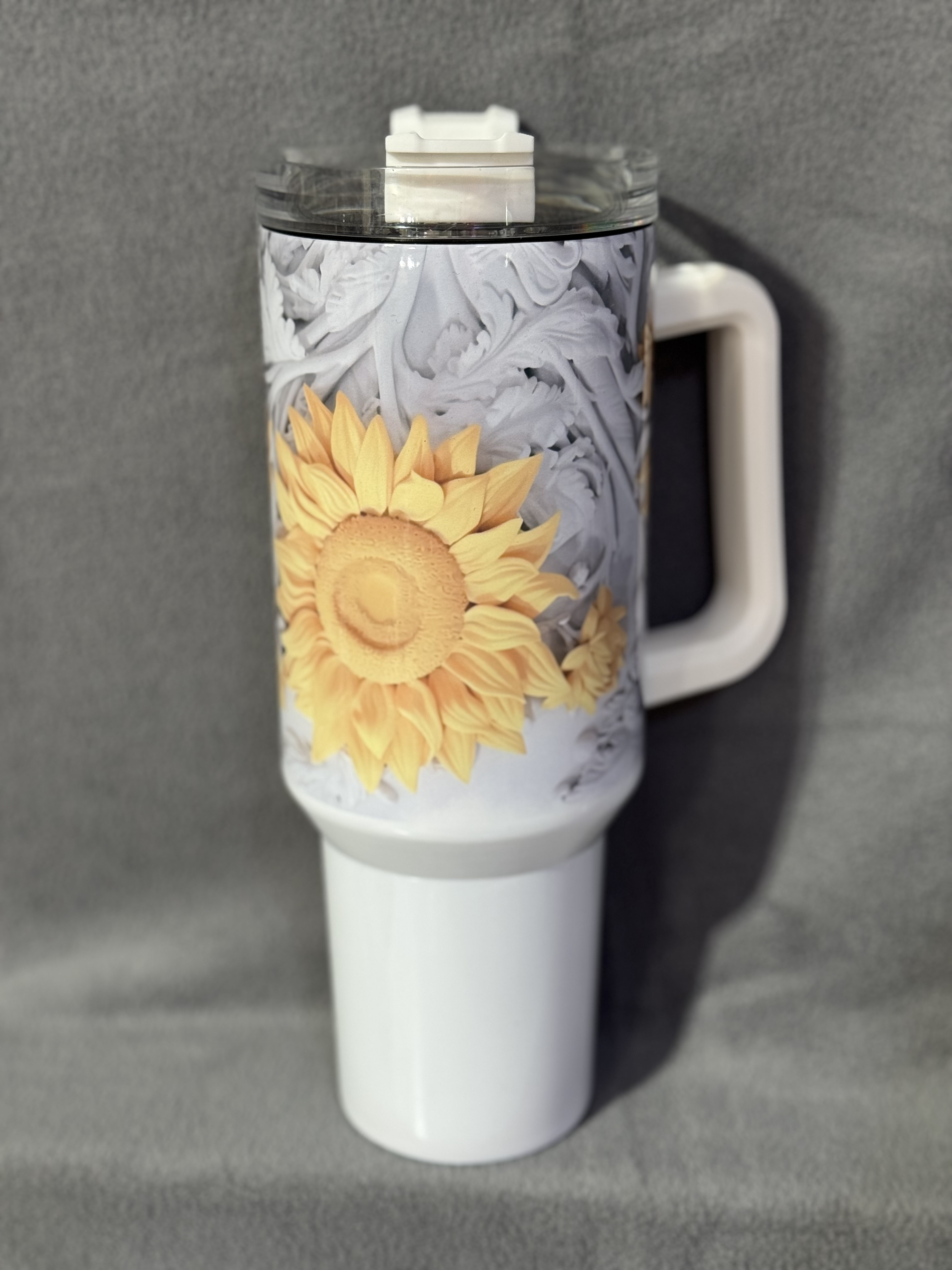 White handled tumbler with large sunflower design
